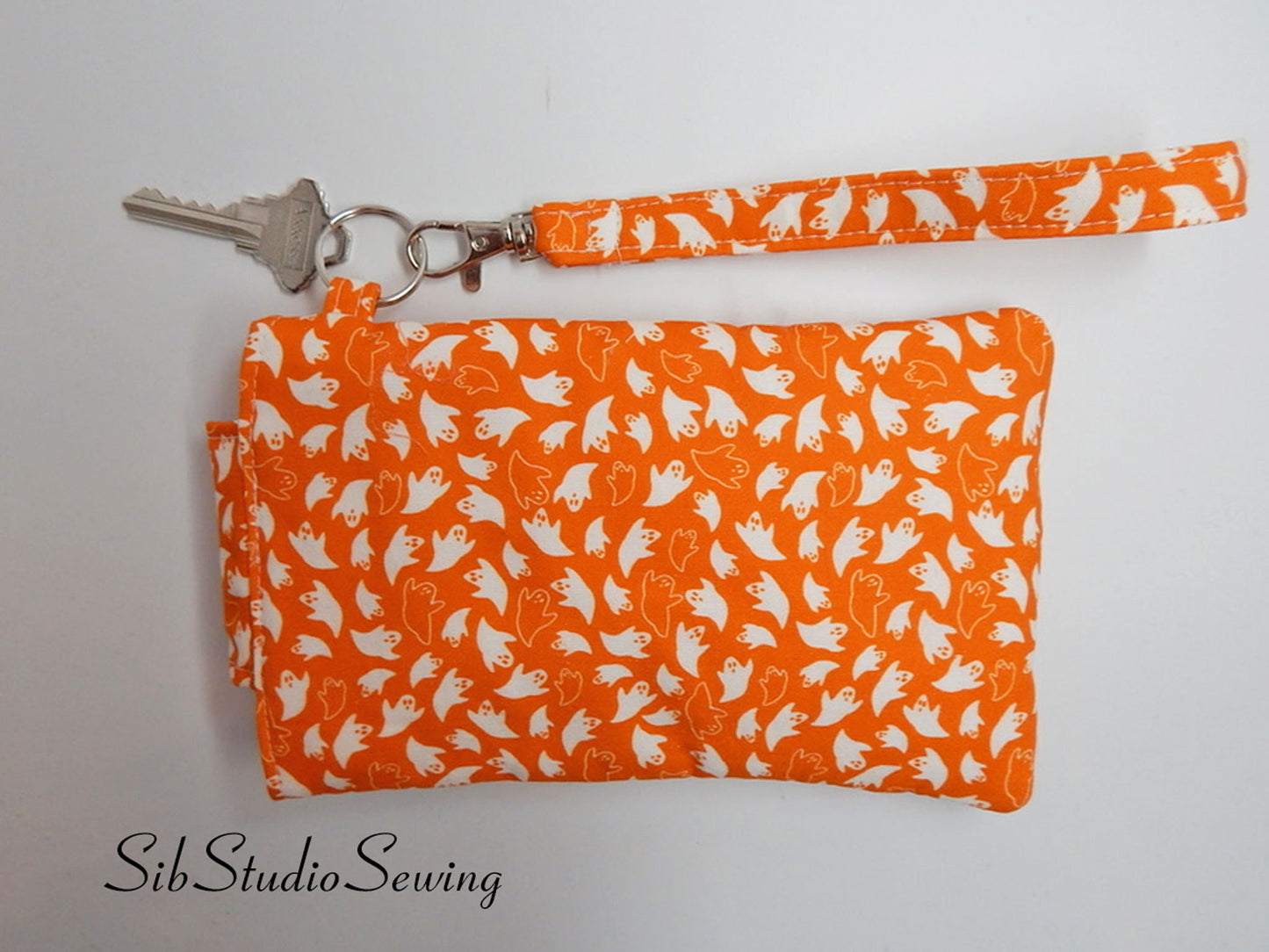 Ghosts Phone Wristlet: Halloween Smartphone Holder with Key Ring, Fits iPhone 16, Phones up to 6.5", Pocket