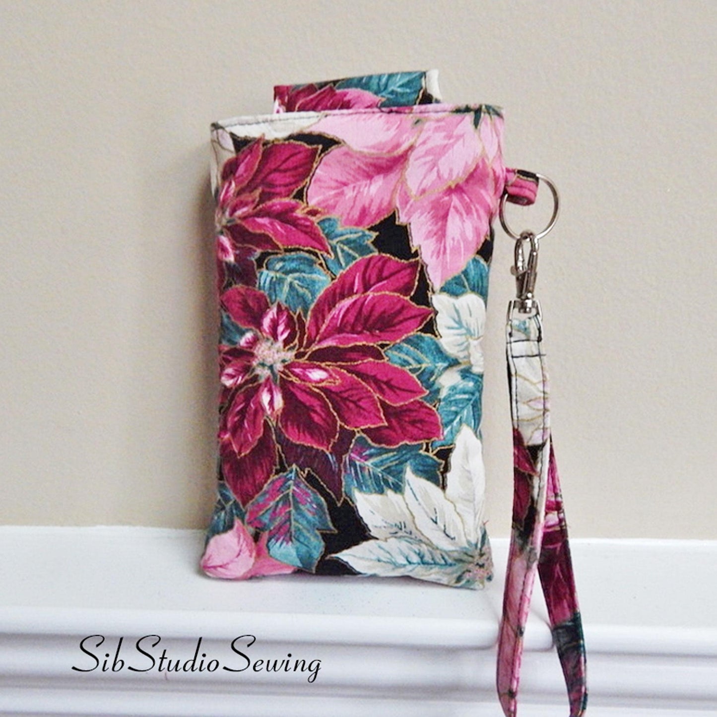Poinsettias Phone Wristlet: Christmas Clutch with Key Ring, Fits iPhone 16, 15, Smartphones up to 6.5" x 3.25", Pocket