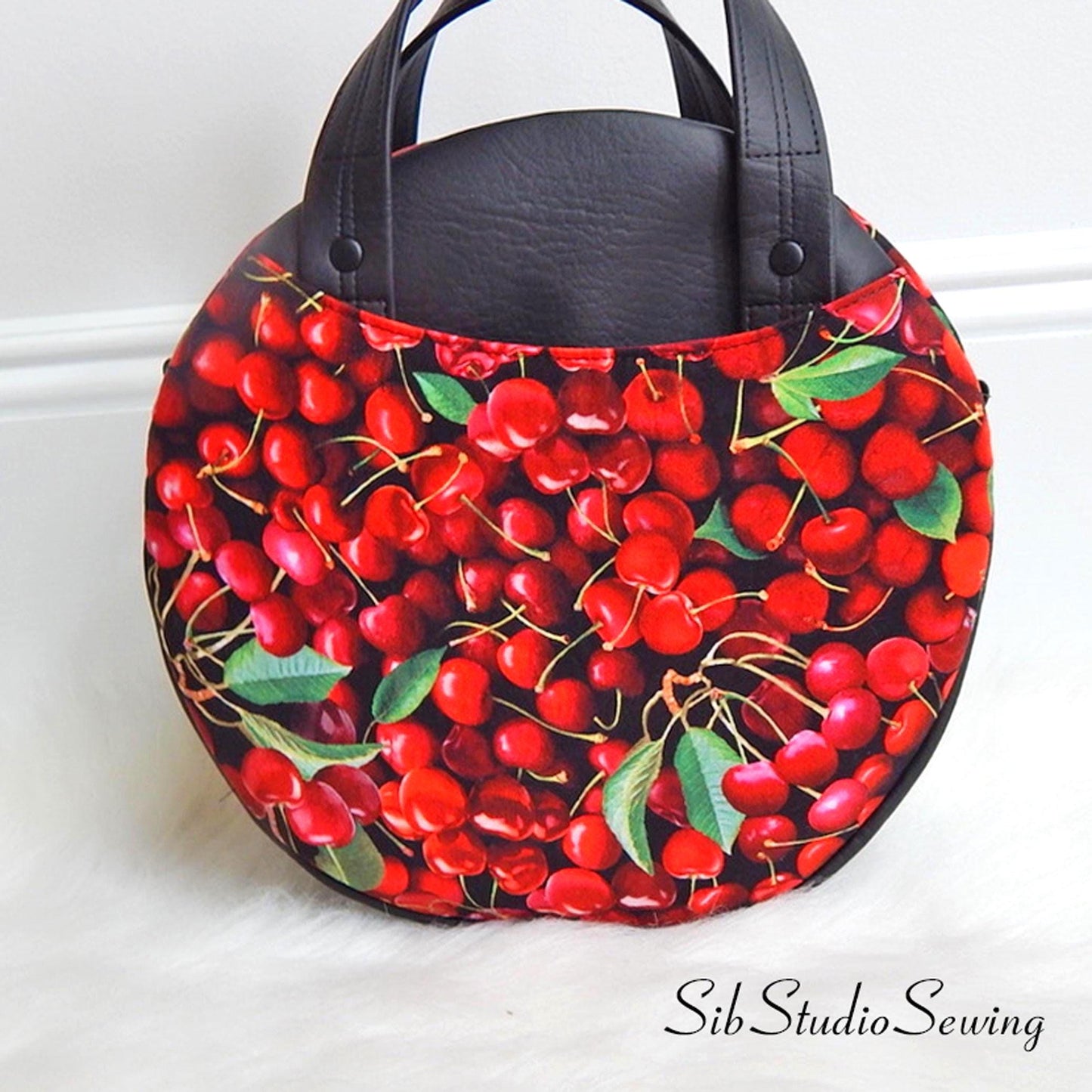 Cherry Circle Crossbody Bag: Faux Leather Top Handle Purse, 10 x 10 x 3.5 inches, Removable Crossbody Strap, Zipper Closure, Lots of Pockets