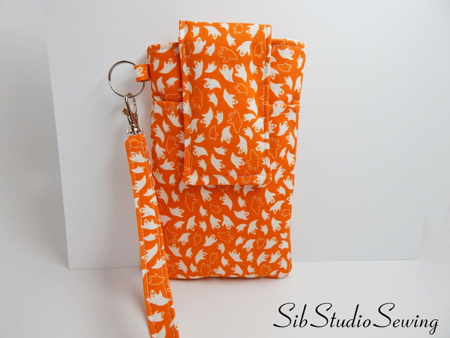 Ghosts Phone Wristlet: Halloween Smartphone Holder with Key Ring, Fits iPhone 16, Phones up to 6.5", Pocket