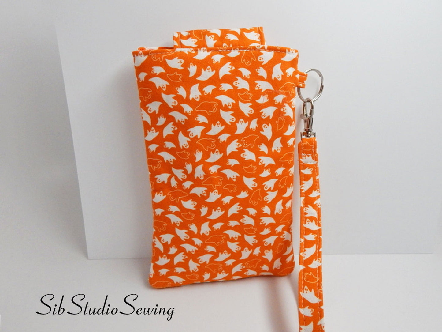 Ghosts Phone Wristlet: Halloween Smartphone Holder with Key Ring, Fits iPhone 16, Phones up to 6.5", Pocket