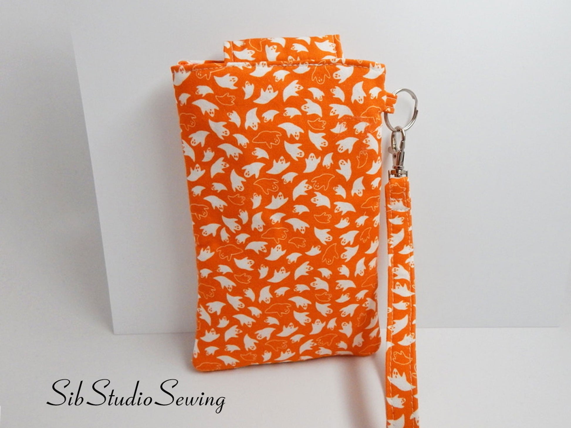 Ghosts Phone Wristlet: Halloween Smartphone Holder with Key Ring, Fits iPhone 16, Phones up to 6.5", Pocket