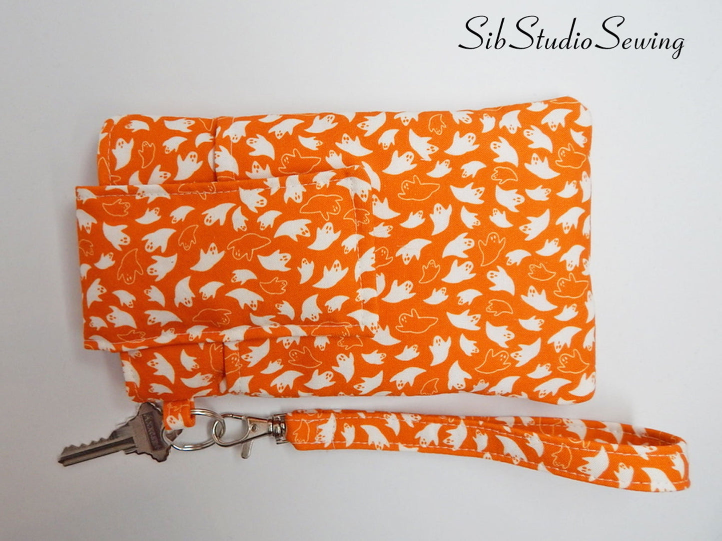 Ghosts Phone Wristlet: Halloween Smartphone Holder with Key Ring, Fits iPhone 16, Phones up to 6.5", Pocket