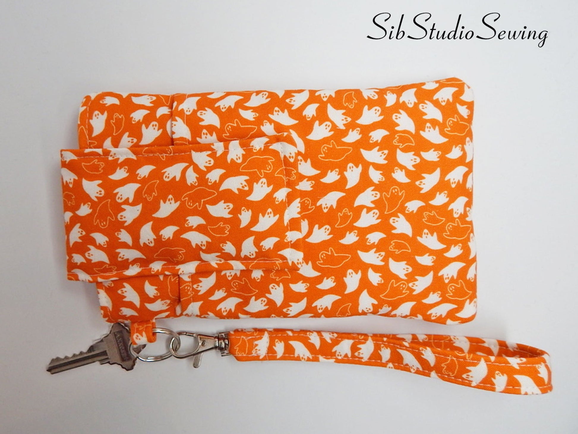 Ghosts Phone Wristlet: Halloween Smartphone Holder with Key Ring, Fits iPhone 16, Phones up to 6.5", Pocket