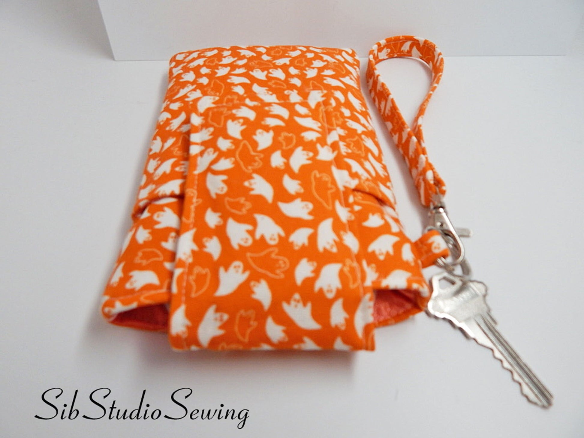 Ghosts Phone Wristlet: Halloween Smartphone Holder with Key Ring, Fits iPhone 16, Phones up to 6.5", Pocket