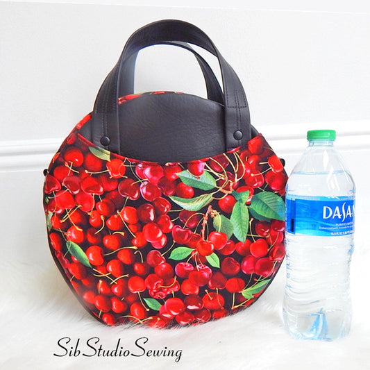 Cherry Circle Crossbody Bag: Faux Leather Top Handle Purse, 10 x 10 x 3.5 inches, Removable Crossbody Strap, Zipper Closure, Lots of Pockets