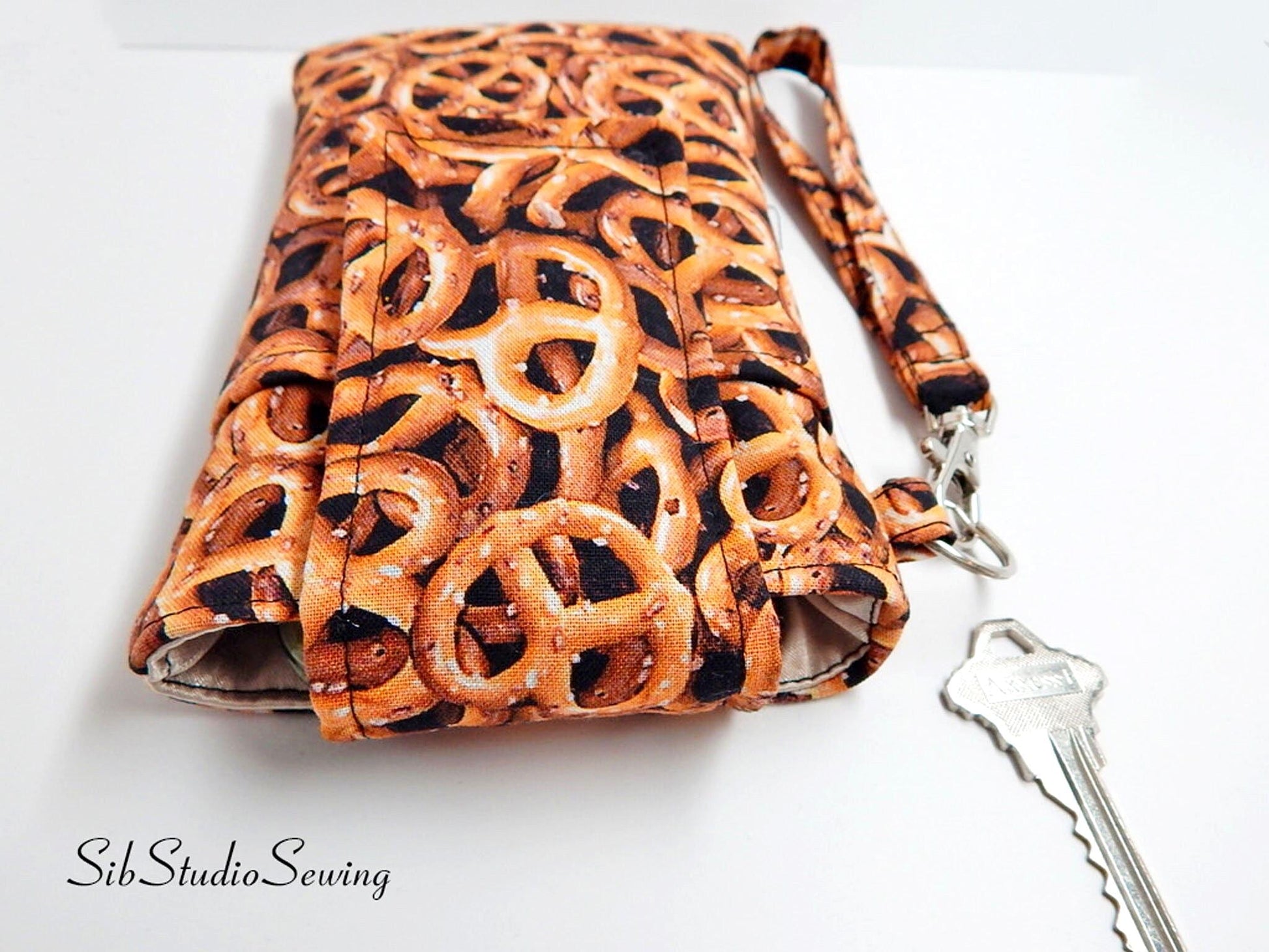 Pretzels Print Smartphone Wristlet: iPhone 17, 16, Phones up to 6.25" x 3.25", Key Ring, Pocket