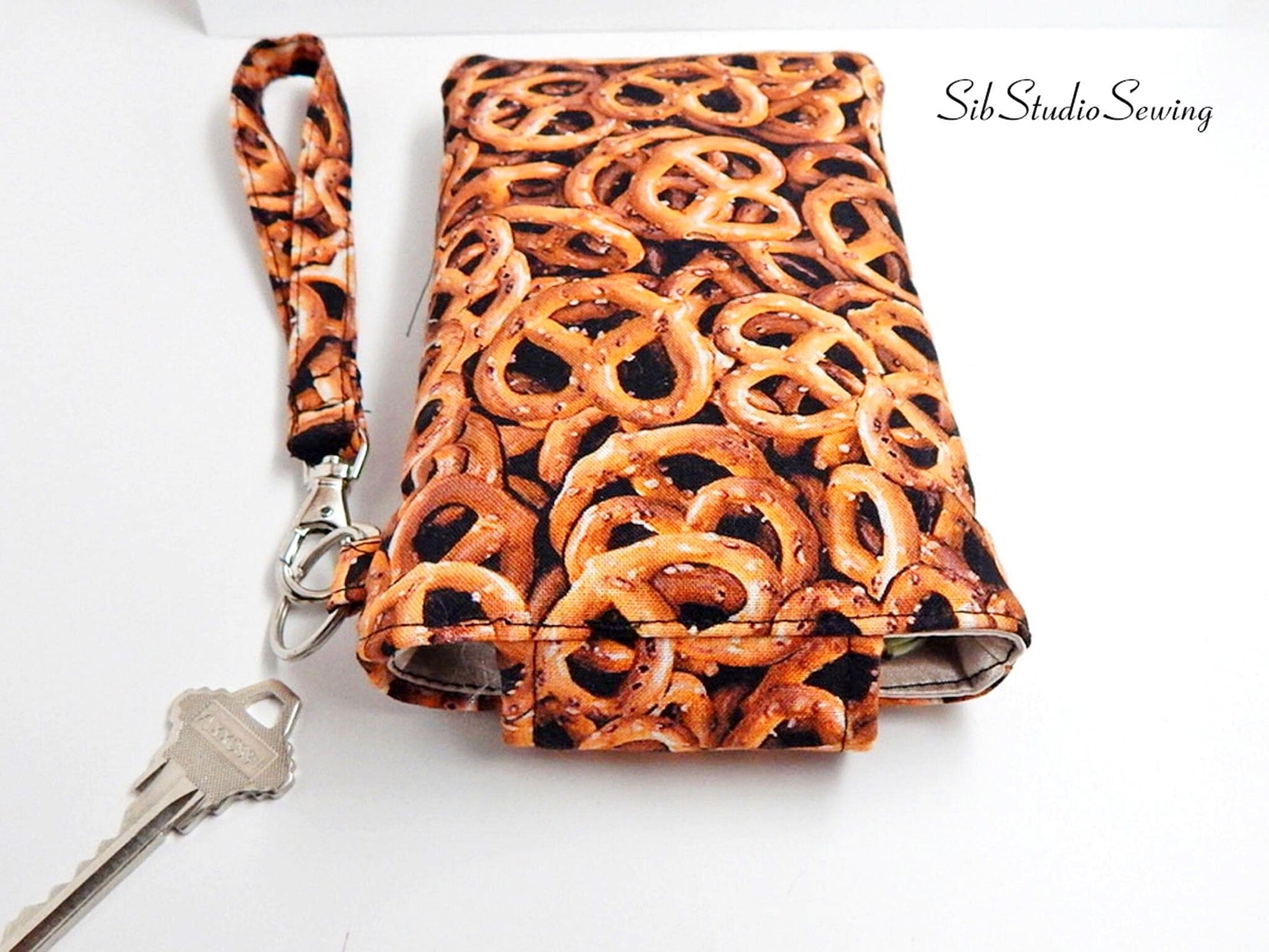 Pretzels Print Smartphone Wristlet: iPhone 17, 16, Phones up to 6.25" x 3.25", Key Ring, Pocket