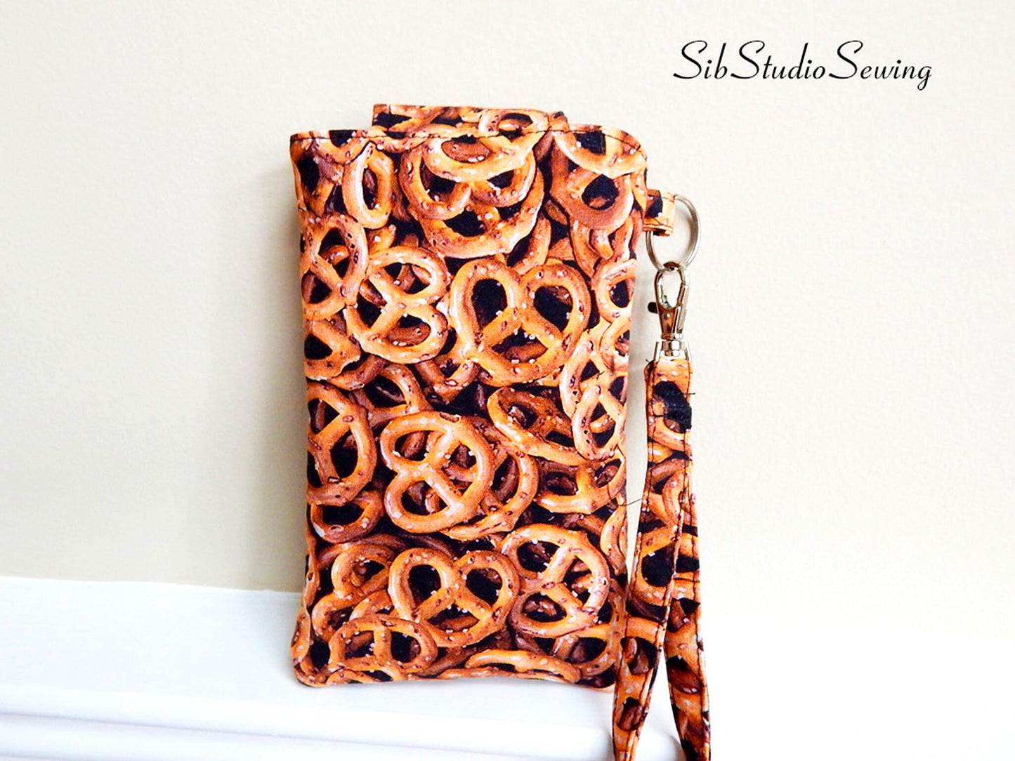 Pretzels Print Smartphone Wristlet: iPhone 17, 16, Phones up to 6.25" x 3.25", Key Ring, Pocket